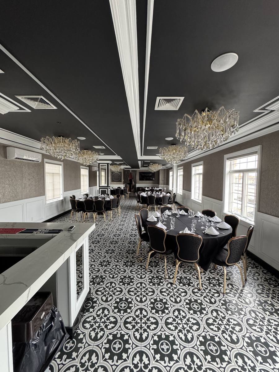 The Chandelier Room with private bar and seated dinner setup