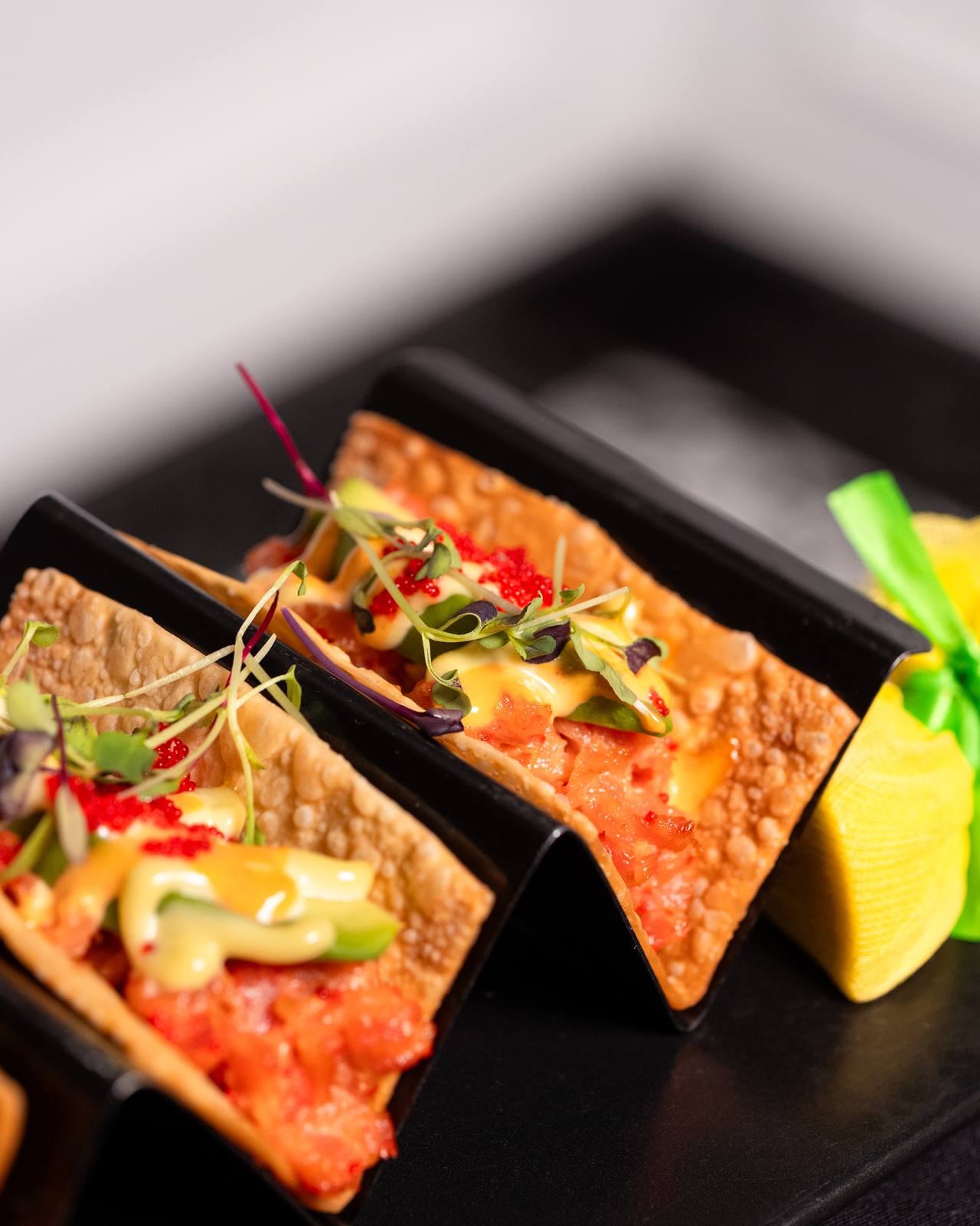 Crispy salmon tartare tacos at Baci